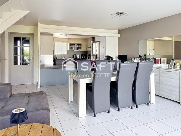 Maison 104 m², 4 chambres, garage et parking