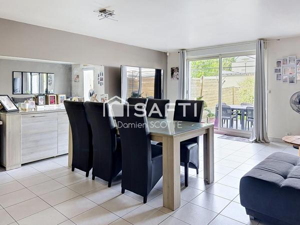Maison 104 m², 4 chambres, garage et parking