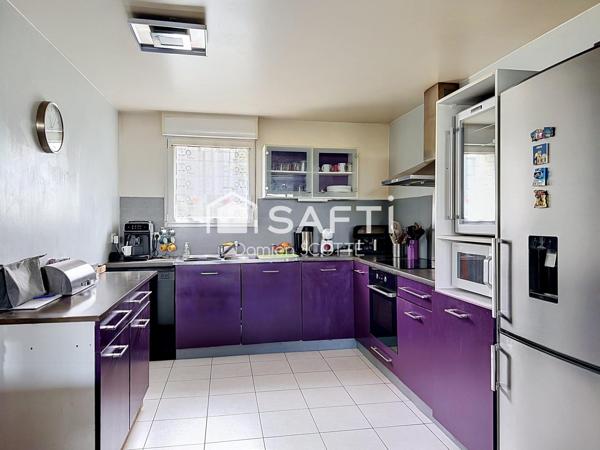 Maison 104 m², 4 chambres, garage et parking