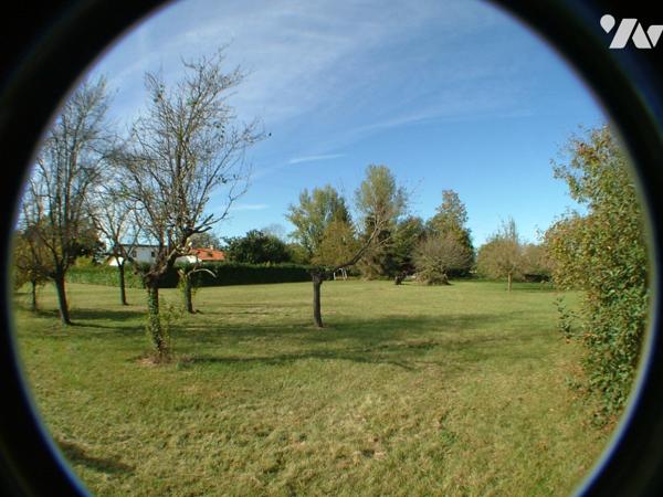 SAINT-GAUDENS OUEST, à 6 km, beau terrain à bâtir plat de 2.941 m². A viabiliser.