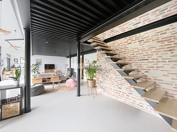 Maison d'Architecte - Vie de plain-pied, DPE A et vaste pièce de vie de 65 m² !