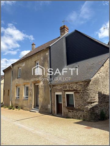 Maison de ville en pierre avec grand garage