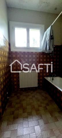 Maison T5 de 140m², 4 chambres, balcon traversant et vue dégagée, un garage de plus de 35m², jardin de 1100m²