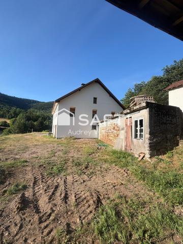 Maison Familiale sur un décor de carte postale