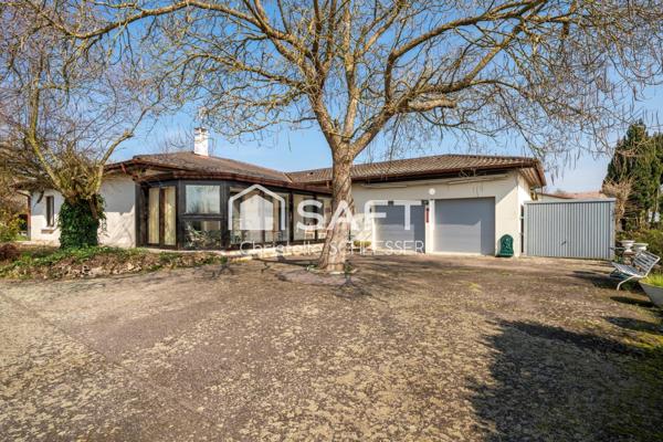 Maison de Plain-Pied au Cœur d'un Écrin de Verdure