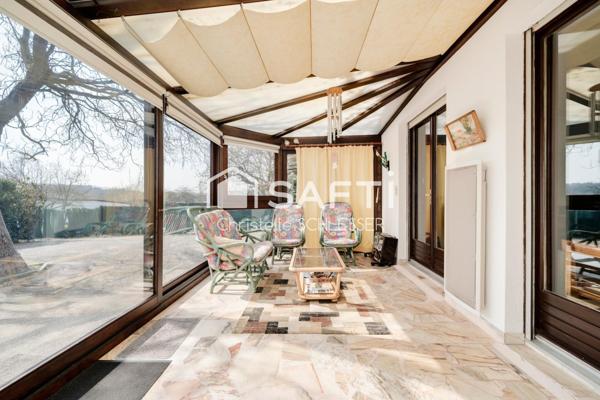 Maison de Plain-Pied au Cœur d'un Écrin de Verdure