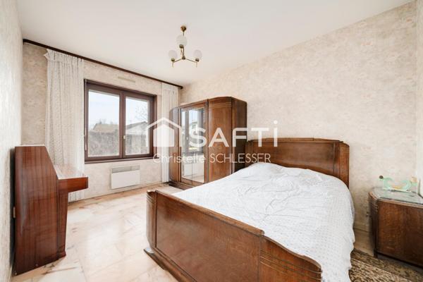 Maison de Plain-Pied au Cœur d'un Écrin de Verdure