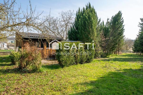 Maison de Plain-Pied au Cœur d'un Écrin de Verdure