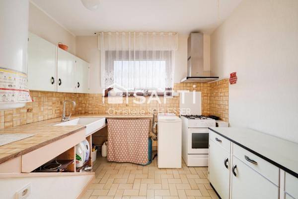 Maison de Plain-Pied au Cœur d'un Écrin de Verdure