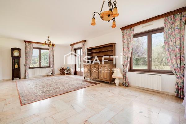 Maison de Plain-Pied au Cœur d'un Écrin de Verdure