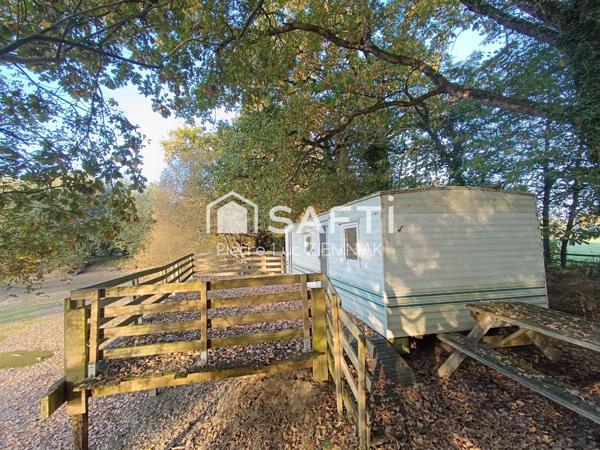 Terrain de loisirs avec étang et mobil-home – 4100 m² clos à Houssay (53360)