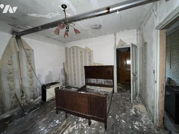 Ancien corps de ferme et terrains