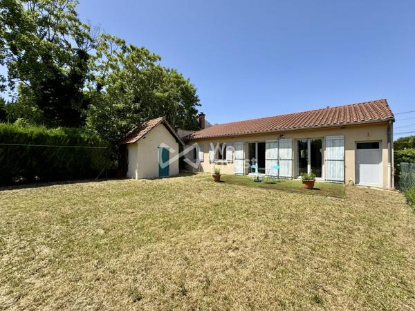Maison de plain-pied de 2006, 95 m² habitables, 3 chambres, garage, parcelle de 906 m²