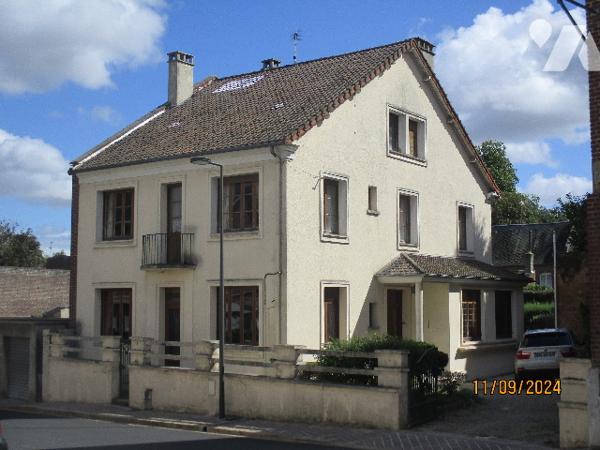 A HAM (SOMME) 80400, maison de style 
Terrain, bâtiment (dont partie Garage)