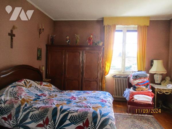 A HAM (SOMME) 80400, maison de style 
Terrain, bâtiment (dont partie Garage)