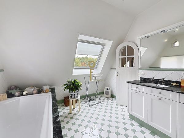 Maison de caractère au Cartelot avec jardin paysager