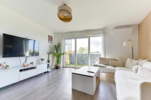 Appartement lumineux avec balcon et 2 places de parking