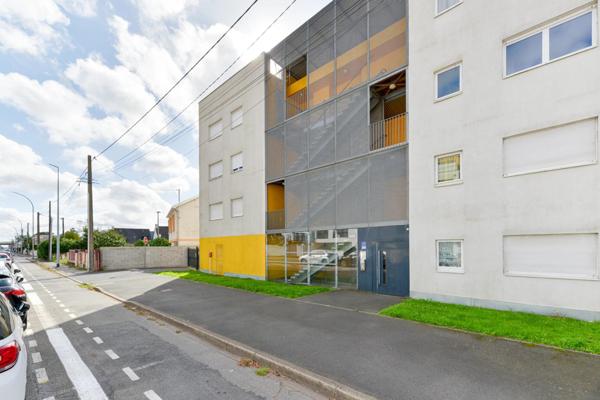 Appartement lumineux avec balcon et 2 places de parking