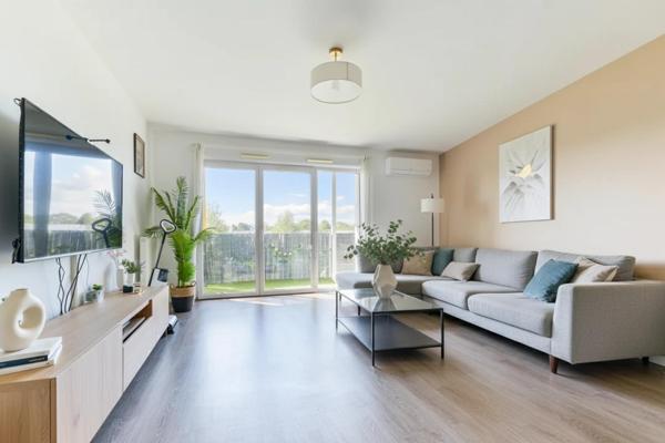 Appartement lumineux avec balcon et 2 places de parking