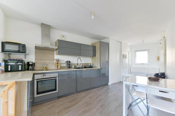 Appartement lumineux avec balcon et 2 places de parking