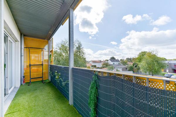 Appartement lumineux avec balcon et 2 places de parking