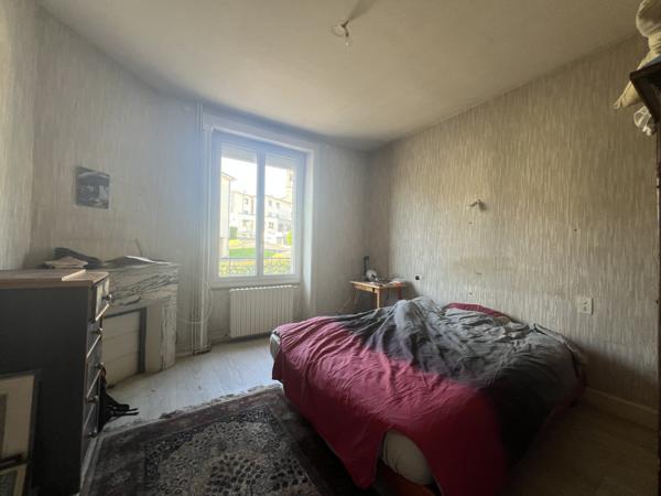 MAISON 4 pièces AURILLAC (15) en pierre et jardin
