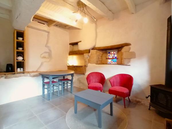 BELLE RENOVATION EN PIERRE ET POUTRES APPARENTES