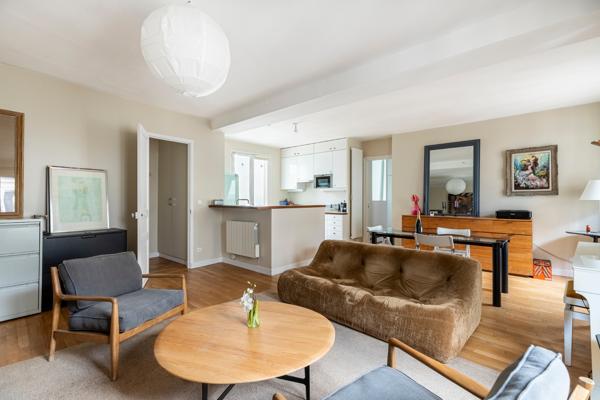 Place des Victoires – Élégant 68 m² – Traversant – 2 chambres possibles – Parking à proximité