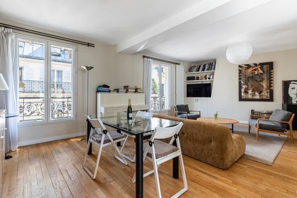 Place des Victoires – Élégant 68 m² – Traversant – 2 chambres possibles – Parking à proximité