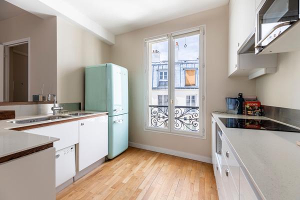 Place des Victoires – Élégant 68 m² – Traversant – 2 chambres possibles – Parking à proximité