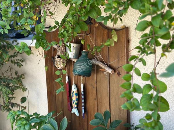 Maison familiale pleine de charme avec véranda, jardin intimiste sans vis-à-vis et grand garage double de plus de 40 m²