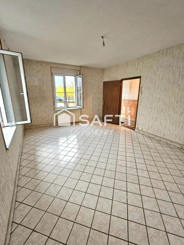 Maison individuelle de 3 chambres avec garage et grand terrain