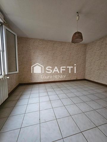 Maison individuelle de 3 chambres avec garage et grand terrain