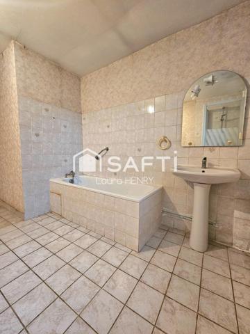 Maison individuelle de 3 chambres avec garage et grand terrain