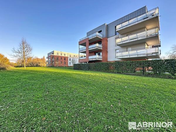 Appartement de type 3 de 2015 exposé S/O avec balcon et parking - 2 chambres - Cadre exceptionnel. COMINES