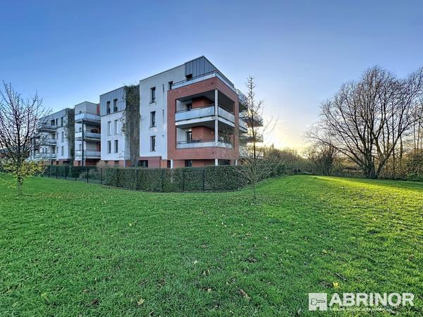 Appartement de type 3 de 2015 exposé S/O avec balcon et parking - 2 chambres - Cadre exceptionnel. COMINES