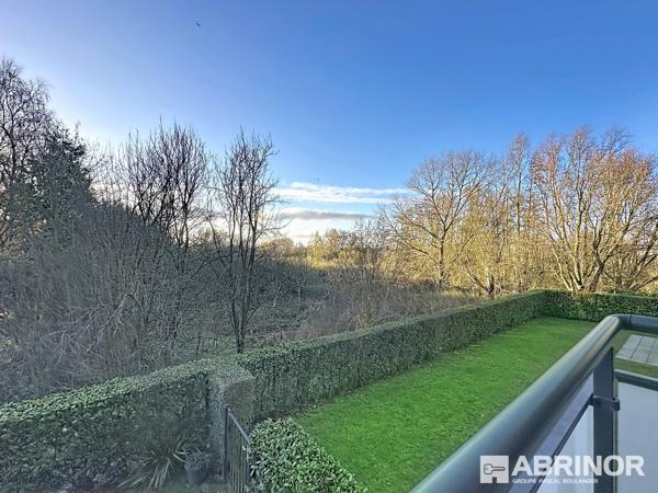 Appartement de type 3 de 2015 exposé S/O avec balcon et parking - 2 chambres - Cadre exceptionnel. COMINES