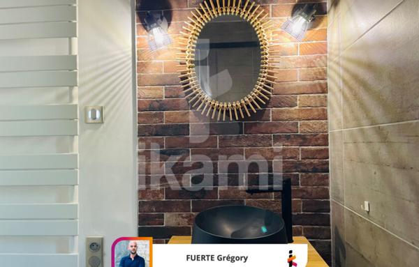 Appartement T3 de 70 m2 avec balcon, vue dégagée et parc privatif