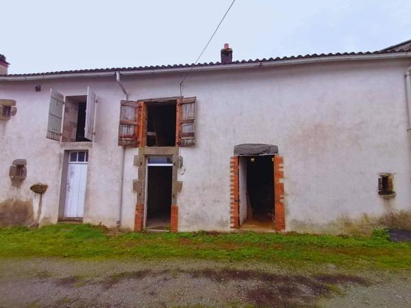Maison en pierre avec dépendances et terrain à Darnac