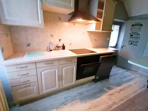 Maison en pierre avec dépendances et terrain à Darnac