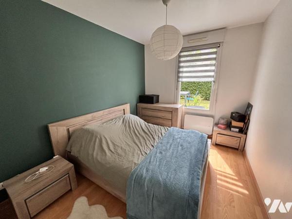 MONDEVILLE / APPARTEMENT DE TYPE F3 EN REZ DE JARDIN