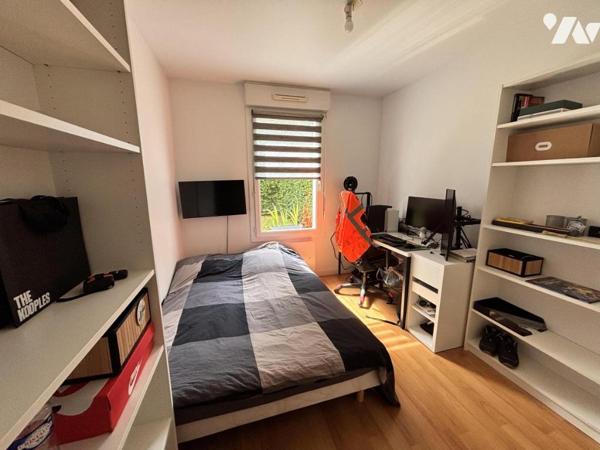 MONDEVILLE / APPARTEMENT DE TYPE F3 EN REZ DE JARDIN