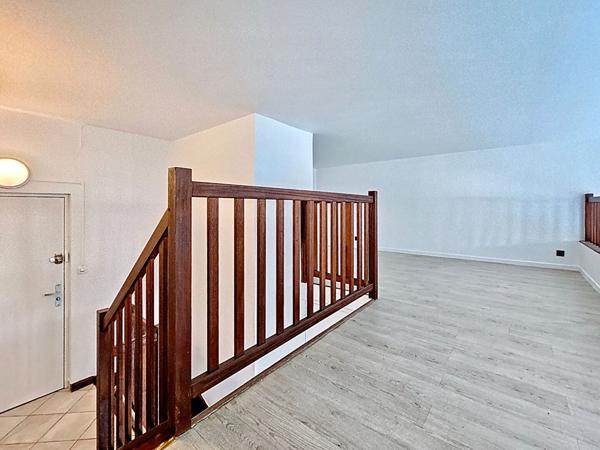 Duplex avec terrasse - stationnement au sous sol - rénovation énergétique récente