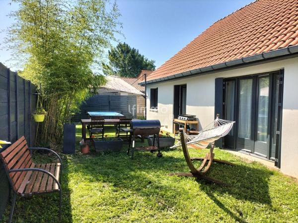 Maison rénovée avec jardin et garage