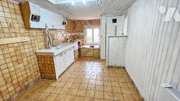 BRASLES - à 5 minutes de Château-Thierry, maison mitoyenne à rénover