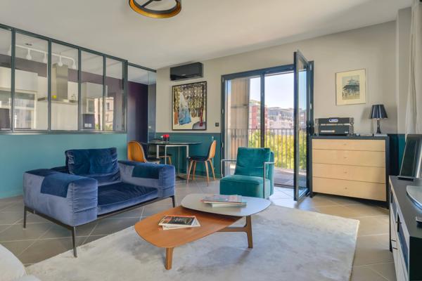 Lyon 3 - Appartement de 87,83 m² - 2 chambres - 1 balcon - Garage double