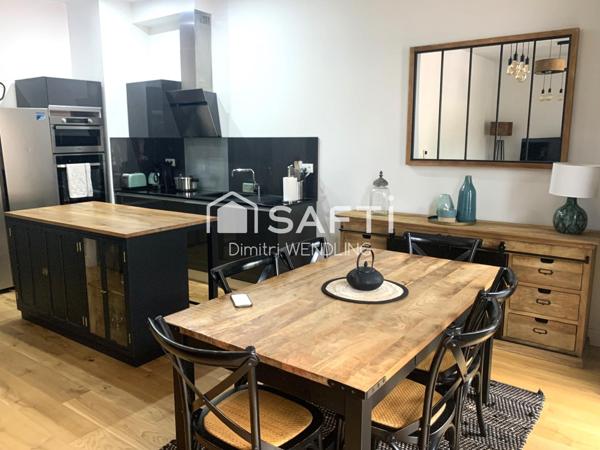 Appartement livré de 2022 au sein d'un bâtiment historique.