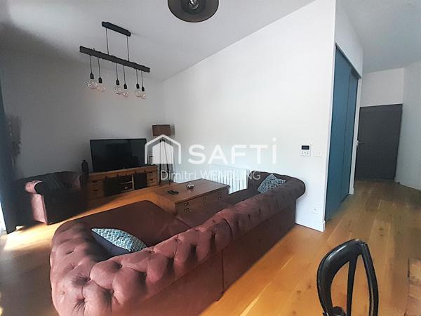 Appartement livré de 2022 au sein d'un bâtiment historique.