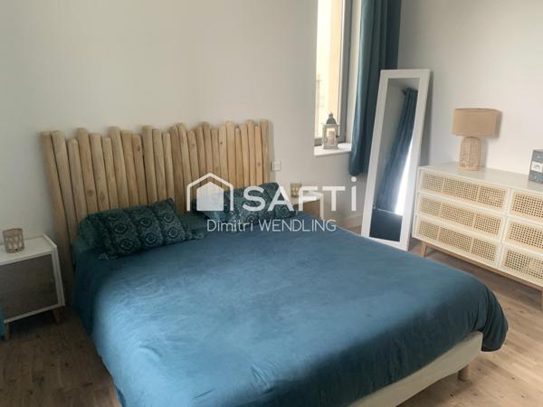 Appartement livré de 2022 au sein d'un bâtiment historique.