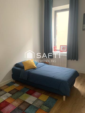 Appartement livré de 2022 au sein d'un bâtiment historique.